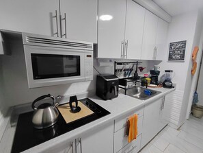 Microwave, coffee/tea maker, electric kettle, toaster