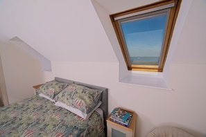 4 bedrooms, desk, iron/ironing board, travel cot