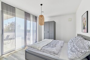 Attico Deluxe, 1 camera da letto | Postazione laptop, tende oscuranti, ferro/asse da stiro, Wi-Fi gratuito