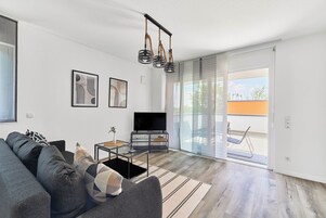 Deluxe Penthouse, 1 Bedroom | Living area