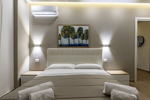 1 غرفة نوم ومكواة/لوح كي وواي فاي وملاءات أسرّة