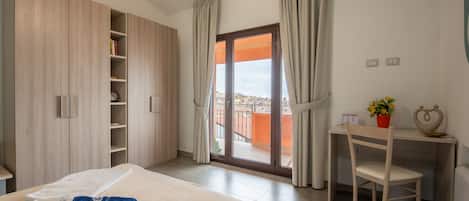 2 quartos, ferros/tábuas de passar roupa, Wi-Fi de cortesia