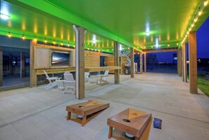 Terrace/patio - Sleeps 21, 2 Homes | Private Pool, Patio Lounge w/ Fire Pit, Bar, TV, & Games (Port Aransas)