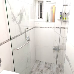 Douche, sèche-cheveux, serviettes fournies
