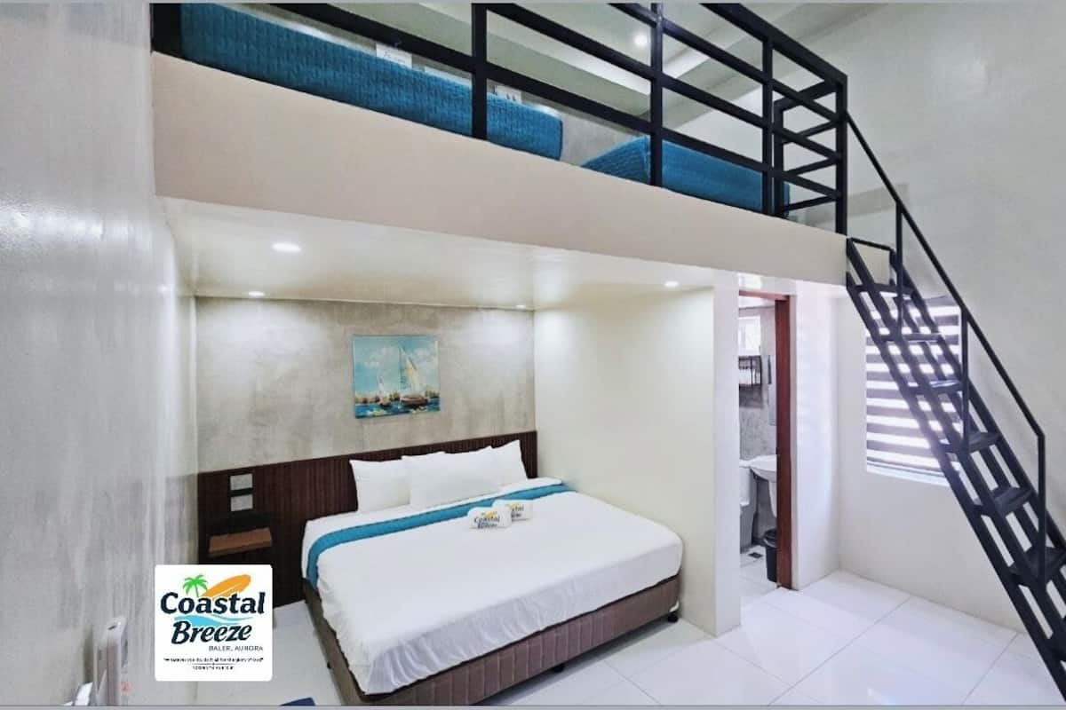 Neljän hengen deluxe-huone