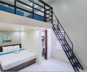 Deluxe Quadruple Room | Desk, laptop workspace, free WiFi - Coastal Breeze Hotel (Baler)