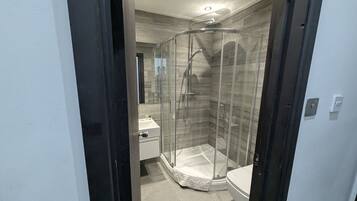 Shower, hair dryer, shampoo