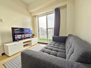 Relax in this urban retreat with a flat-screen TV and city views from the balcony.
