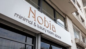 A sign for "Nobia" indicating a minimal and luxury room space. - Nobia 3 (Athens)
