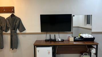 Family Room, City View | Soundproofing, free WiFi