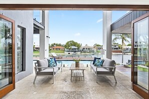 Terrace/patio - Effortless Waterfront Living with Heated Pool & Entertainer’s Layout (Gold Coast)