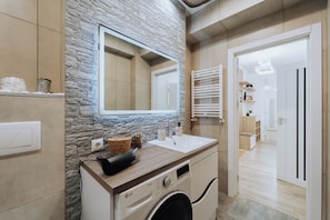 Hair dryer, towels, soap, shampoo