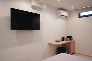 Economy Double Room, Non Smoking, Mezzanine | 1 bedroom, minibar, in-room safe, desk