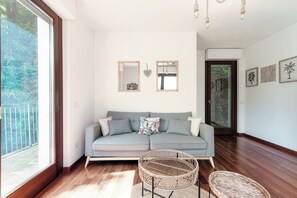Penthouse Deluxe, vue lac | Coin séjour