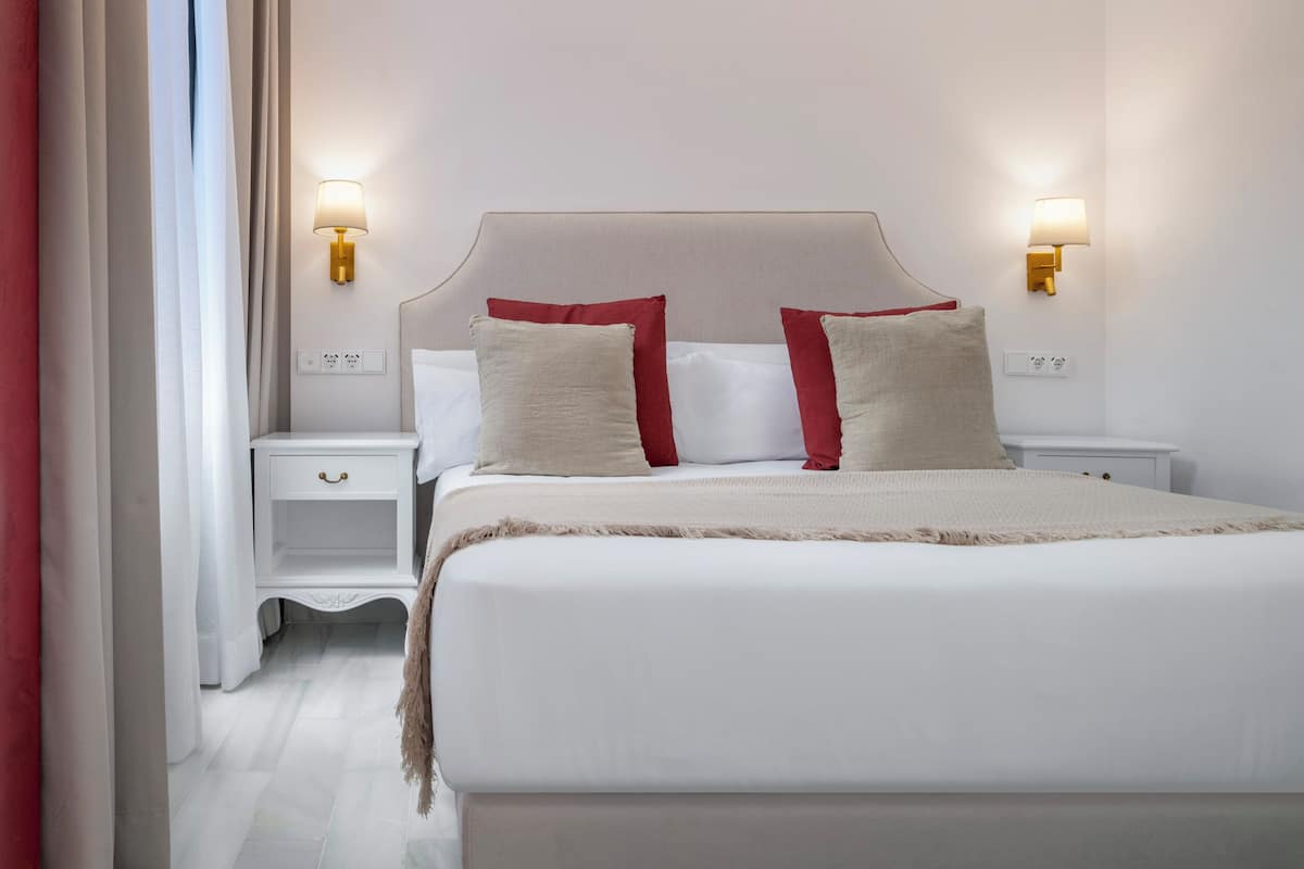 Appartement, 1 slaapkamer, op benedenverdieping | 1 slaapkamer, een strijkplank/strijkijzer, gratis wifi