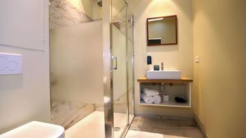 Superior Apartment | Bathroom | Hair dryer, towels, soap, shampoo
