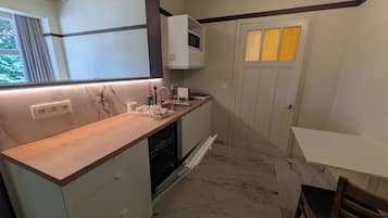 Full-sized fridge, microwave, stovetop, espresso maker