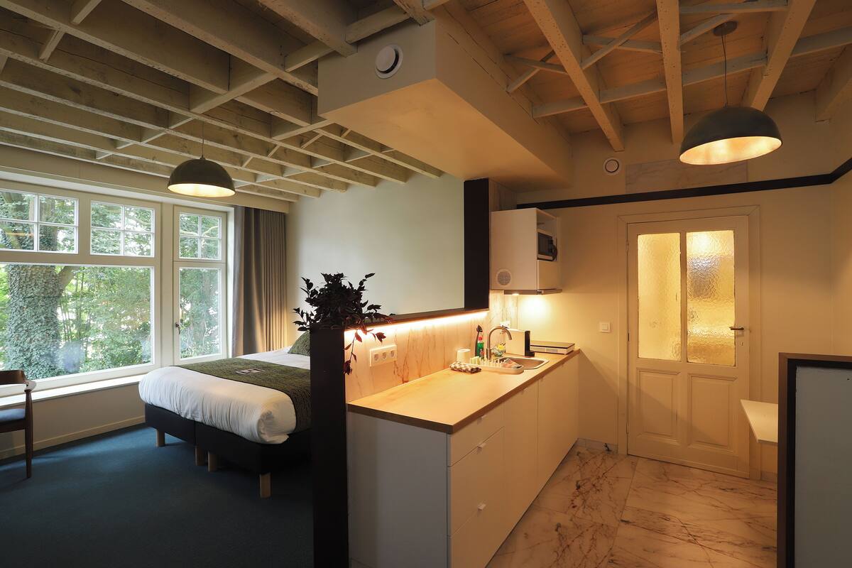 Superior Apartment | Private kitchen | Espresso maker, full-size fridge, microwave, stovetop