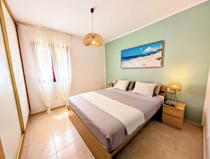 2 bedrooms, in-room safe, iron/ironing board, travel cot