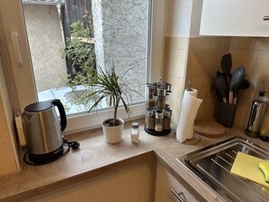 Comfort Apartment, Private Bathroom, River View | Private kitchen | High chair