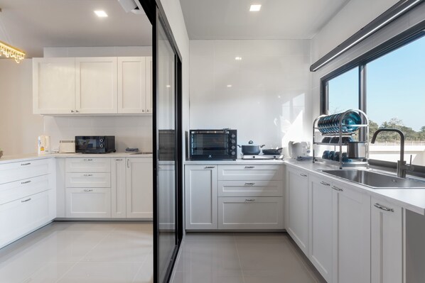 Fridge, microwave, oven, dining tables