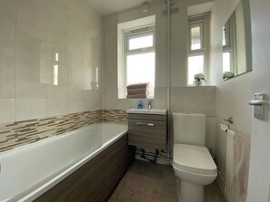 Hair dryer, towels, soap, toilet paper
