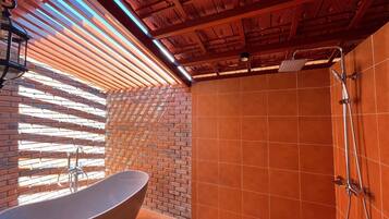 Deluxe Double Room | Bathroom | Shower, hair dryer, bathrobes, slippers