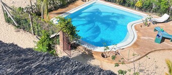 Dive in to our pool and feel the breeze at Mbibo House in the Shela sand dunes