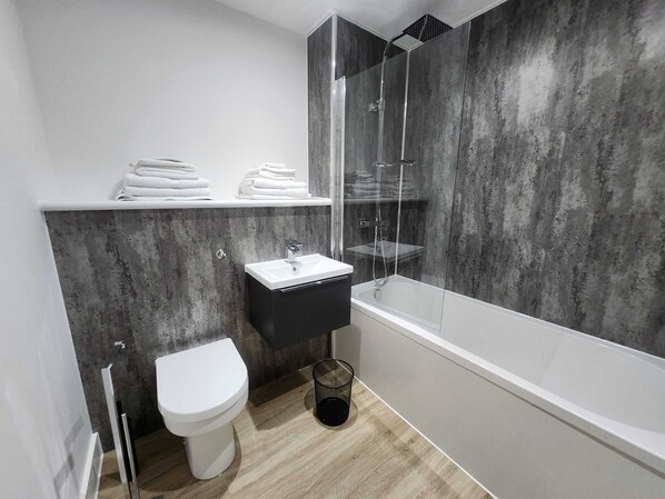 Shower, free toiletries, hair dryer, towels