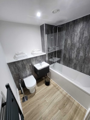 Shower, free toiletries, hair dryer, towels