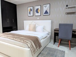 Deluxe Room, Balcony, City View | Desk, laptop workspace, blackout drapes, soundproofing