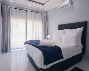 2 bedrooms, bed sheets - The KWASU Apartments. Relaxing Garden Mountain Views KA-4 (Chipata)