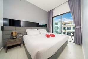 Condo Exclusive, 1 phòng ngủ, ban công, quang cảnh hồ bơi | 1 phòng ngủ, truy cập Internet không dây miễn phí 