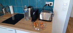 Fridge, microwave, stovetop, coffee/tea maker