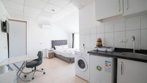 Apartment, 1 Bedroom | 1 bedroom, desk, laptop workspace, iron/ironing board