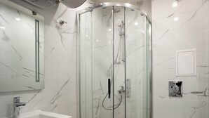 A modern bathroom with a glass-enclosed shower, a white sink, and a toilet. - Pet'inn II, Pet'inn II by Ruby Red House (Sofia)