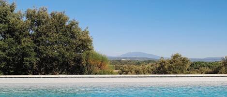 حمّام سباحة خارجي، حمّام سباحة مُدفَّأ