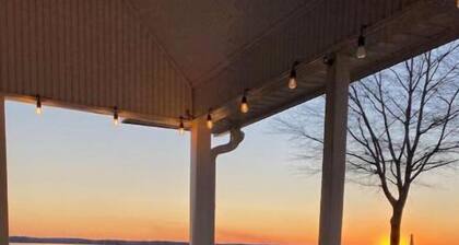 Enjoy this SPECTACULAR VIEW of Lake Wheeler from our beautiful 4 bedroom home!