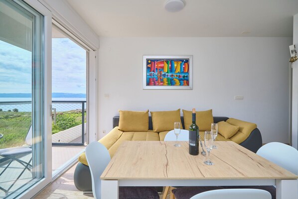 Appartement, vue mer | Coin séjour