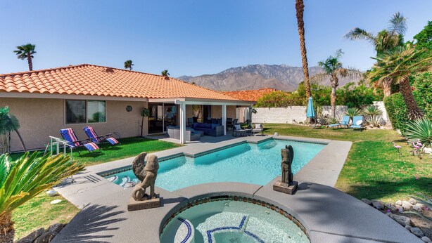 A house with a swimming pool, a covered patio, and a mountain view. - Game Room, Hot Tub & Mtn Views: Palm Springs Gem (Palm Springs)