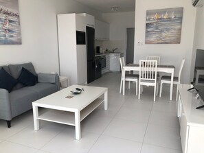 TV, offices - Venus Beach | Elegant 1BR Apt | 100m From Sea | Groundfloor (Paphos)