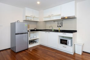 Family Condo, 1 Bedroom, Balcony, Garden View | Private kitchen | Electric kettle