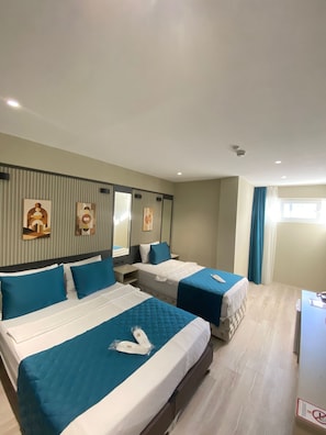 Family Room | In-room safe, blackout curtains, soundproofing, iron/ironing board