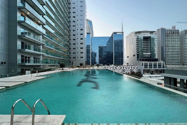 Soak up skyline views from this rooftop pool surrounded by sleek towers and clear skies. A refreshing escape in the heart of modern urban luxury.