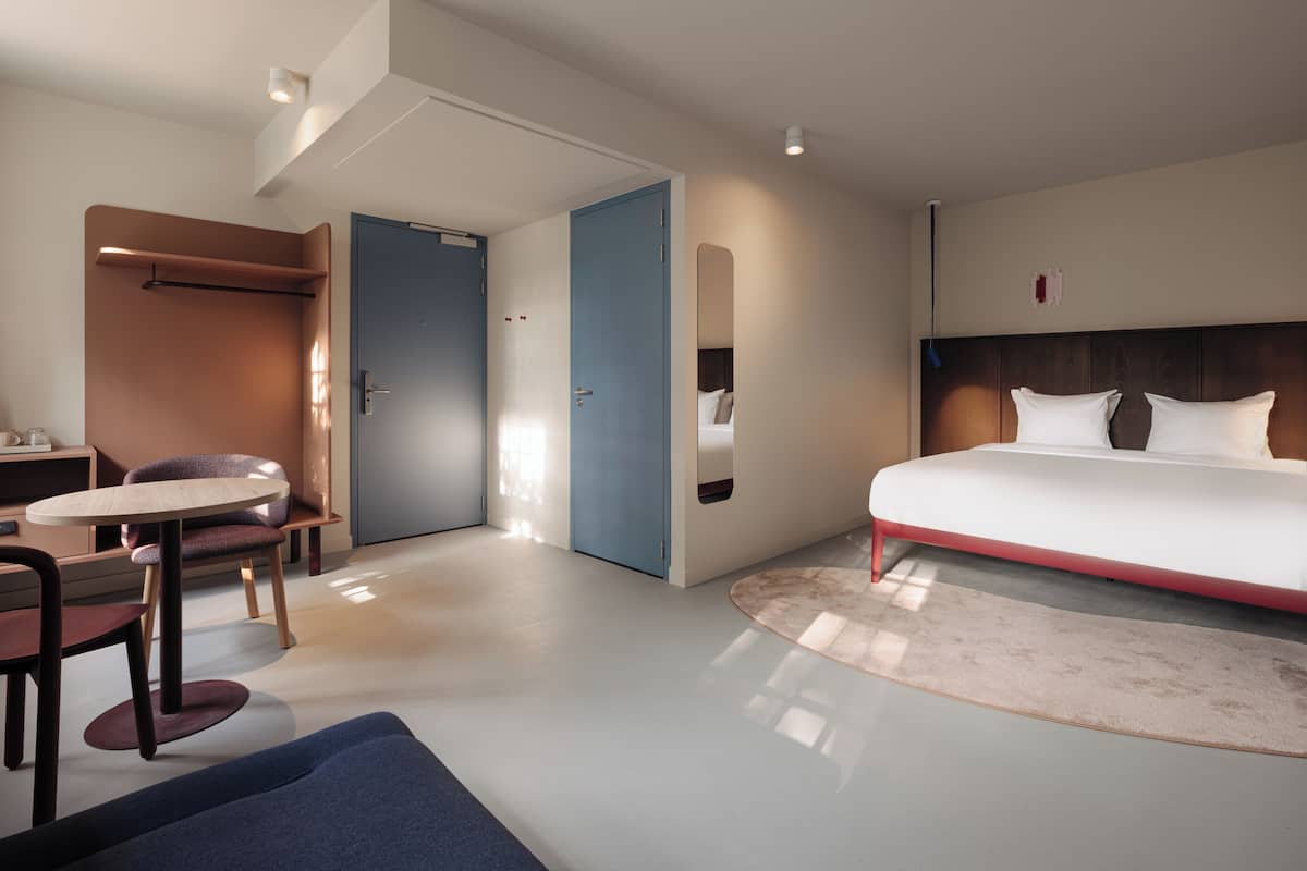Big Double with Sofa | Premium bedding, memory-foam beds, in-room safe, desk