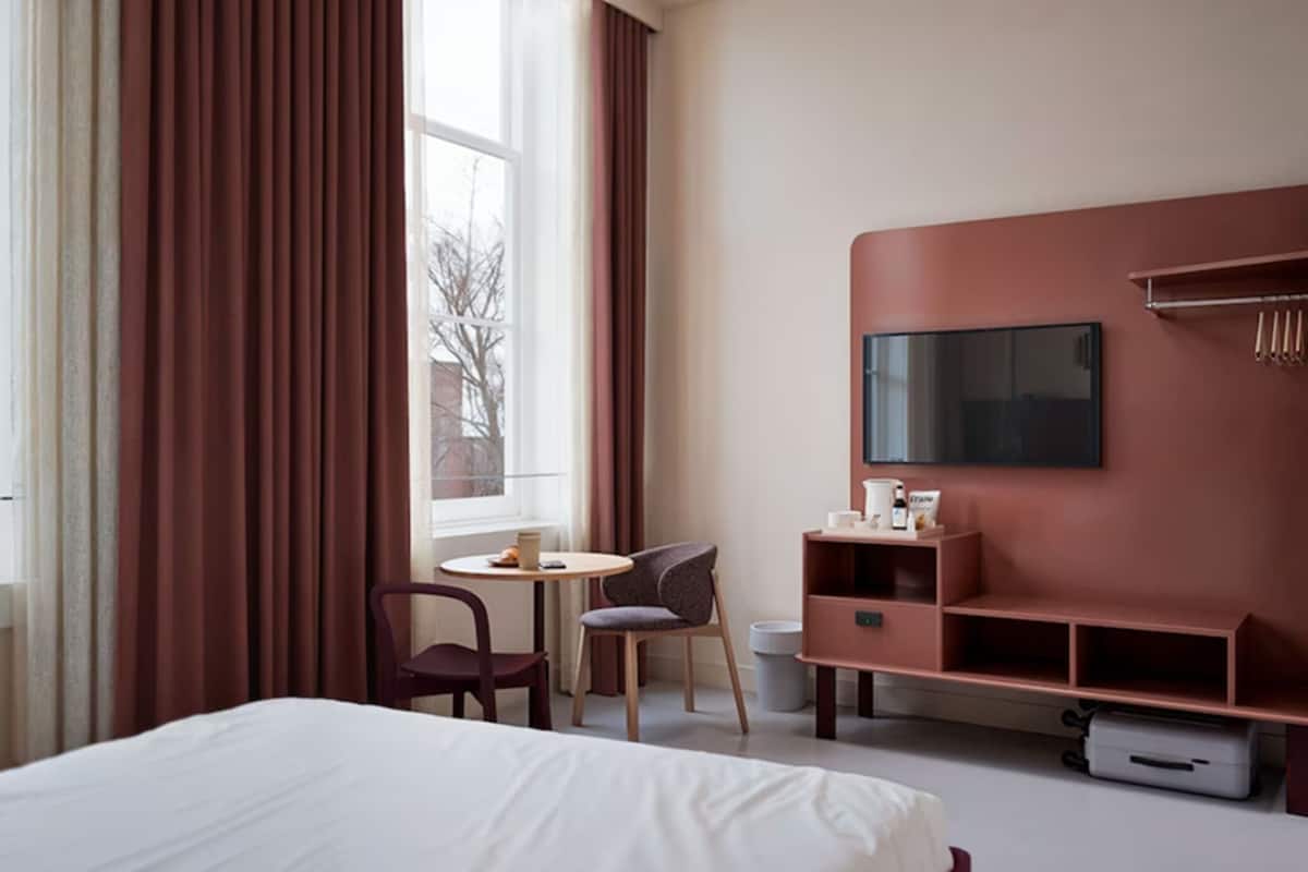 Premium bedding, memory-foam beds, in-room safe, desk
