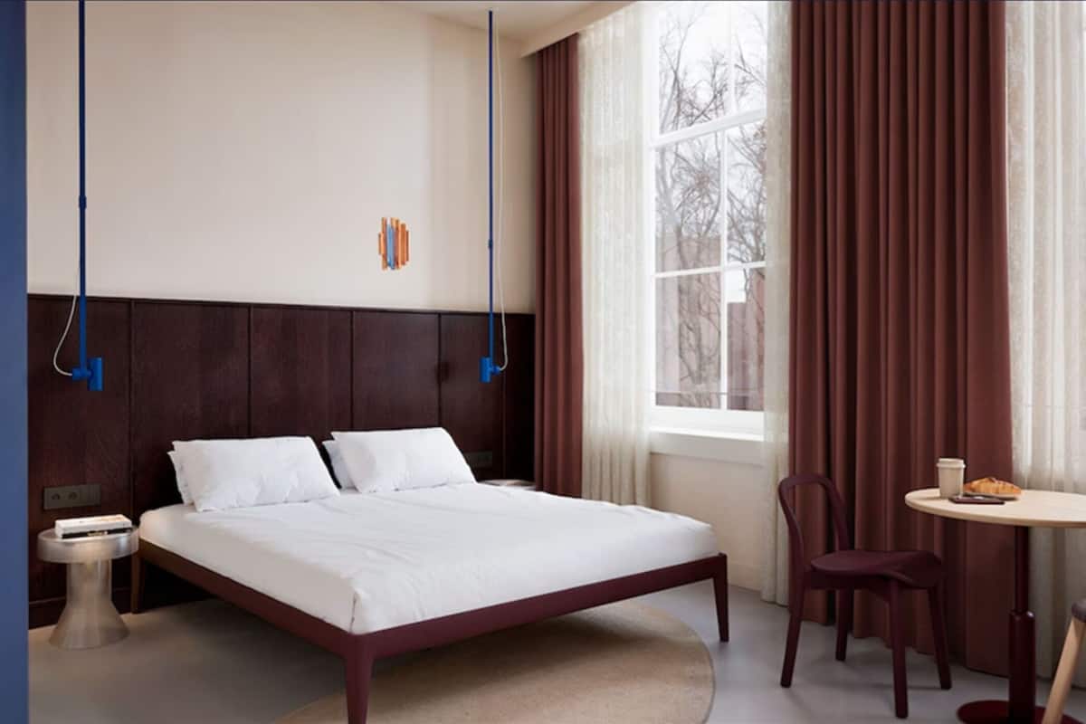 Premium bedding, memory-foam beds, in-room safe, desk