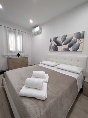 1 habitación, tabla de planchar con plancha, wifi y ropa de cama 