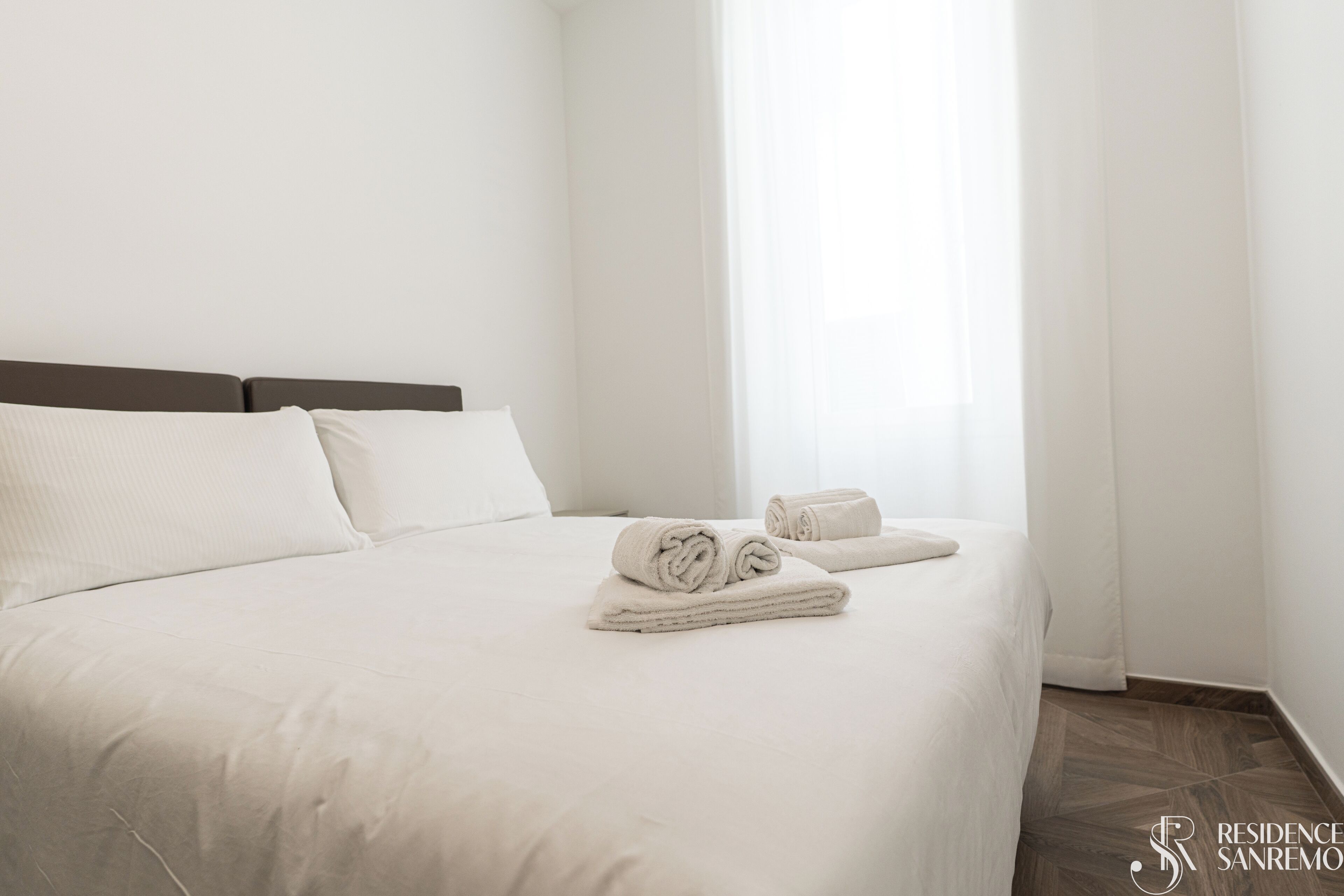 Premium bedding, down duvets, memory-foam beds, in-room safe