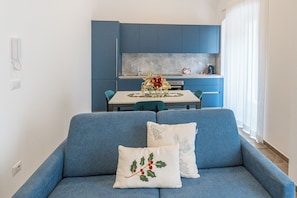 Deluxe-huoneisto | Oleskelualue | Taulutelevisio, Netflix, suoratoistopalvelut, tulostin